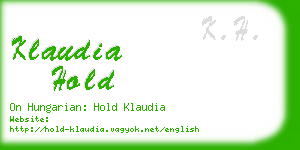 klaudia hold business card
